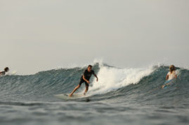 Gabriel surfing in Lohk Nga, Aceh, Sumatra, Indonesia Layback Travel