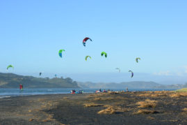 Kite Surfers in Raglan, New Zealand - Layback Travel