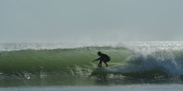 Surfer at the Surfspot River Mouth in El Astillero, Nicaragua