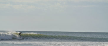 Surfer at Reef in El Astillero - Nicaragua