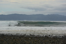 Surfer in Pavones, Costa Rica - Layback Travel